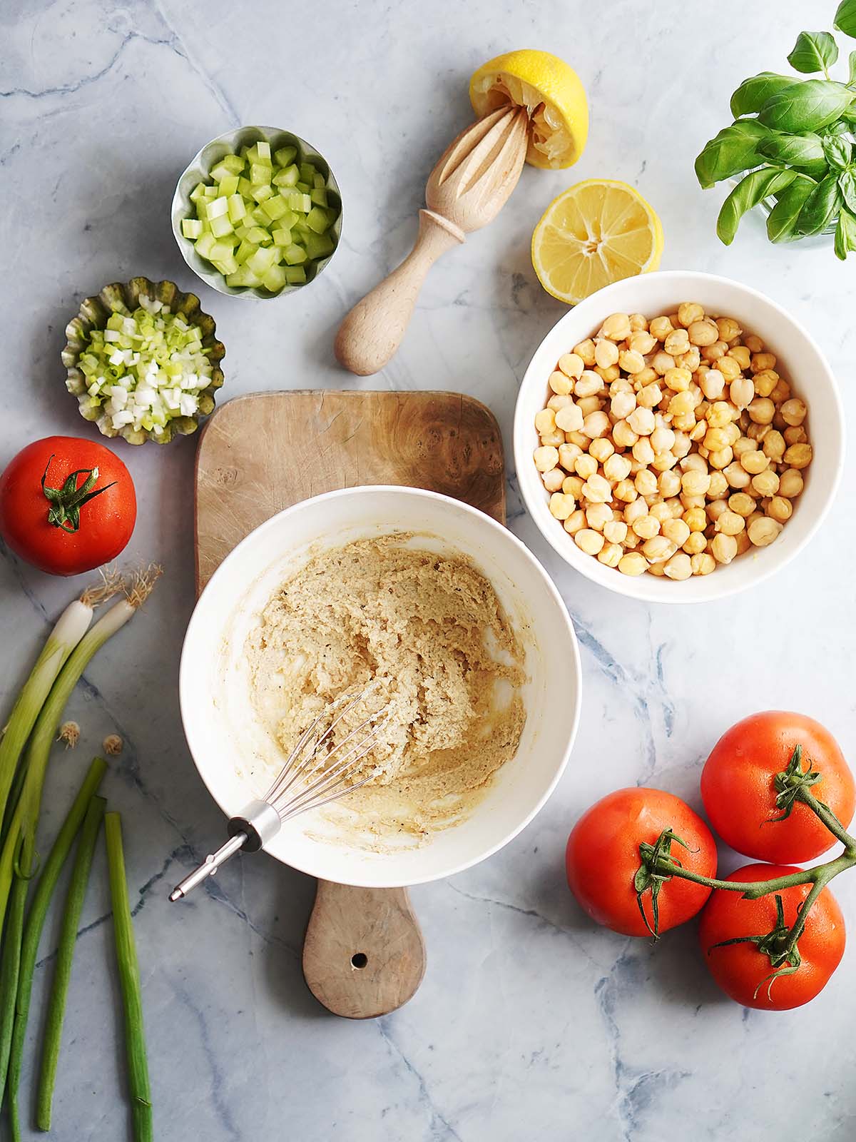 Making the chickpea salad with all ingredients on the side.