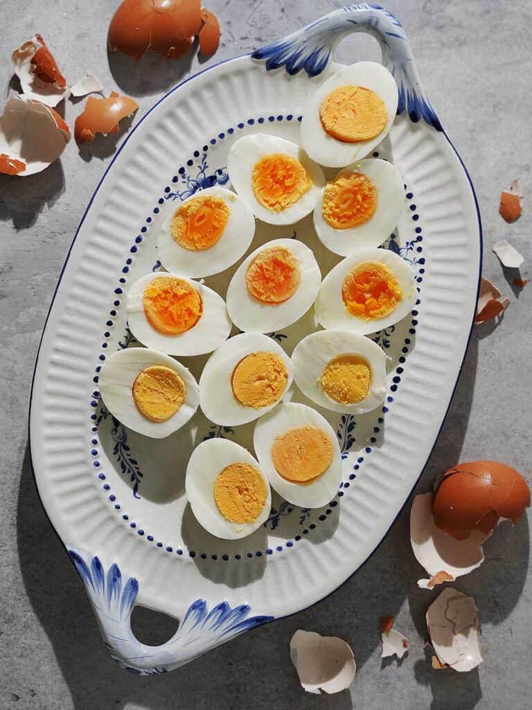 A tray with hard boiled eggs.